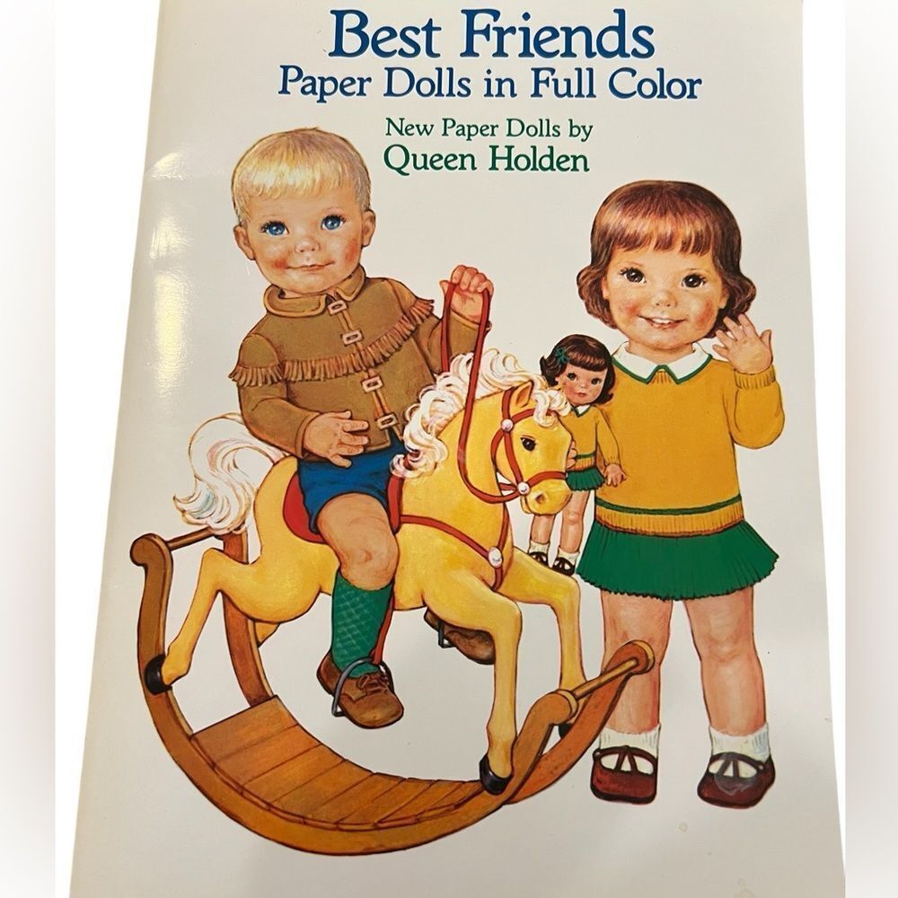 Paper dolls by queen Holden NEW un cut